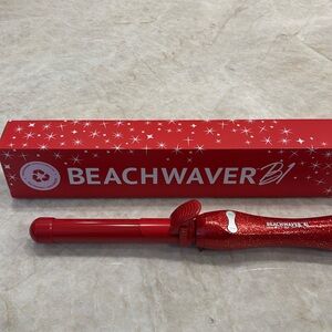 Beachwaver B series rotating curling iron.